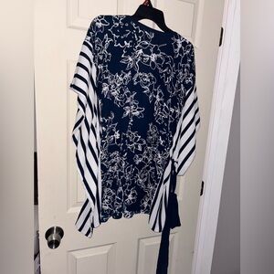 Lane Bryant  Striped Faux Wrap top. 100% Polyester.